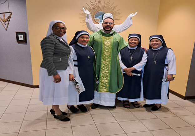 Sr Carol with co-missionaries, the Trinitarian Handmaids of the Divine Word, Quezon City, Philippines. Right: Mother Mary Jovely Adcan, and Sr. Grace. Middle Fr Ruben Leyva, Vincentian Priest and the Administrator of the Blessed Sacrament Parish, Jackonville, Florida. Mid Left: Sr Pat, THDW.